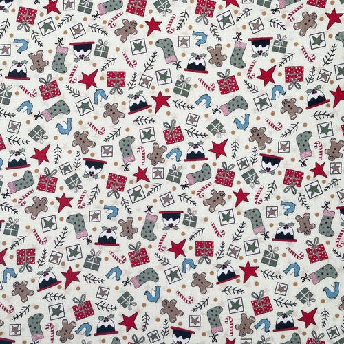 Fabric with a Christmas-themed pattern featuring holiday motifs on a white background.