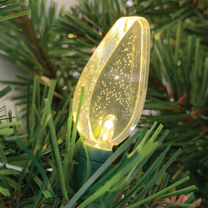 Acrylic C7 warm white bulbs on green wire on a green branch