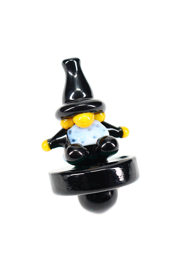 Colorful wizard character glass carb cap with black base, stands upright for airflow control on banger