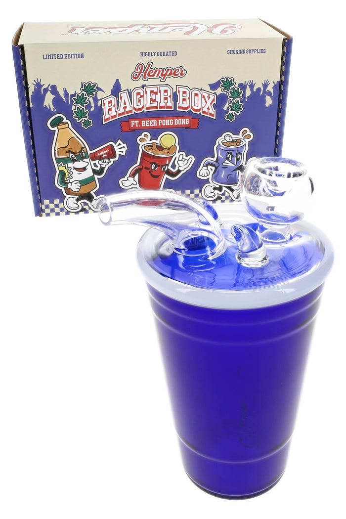 Hemper Rager Box packaging behind blue beer pong bong, showing clear splash mouthpiece and dry herb bowl attachment