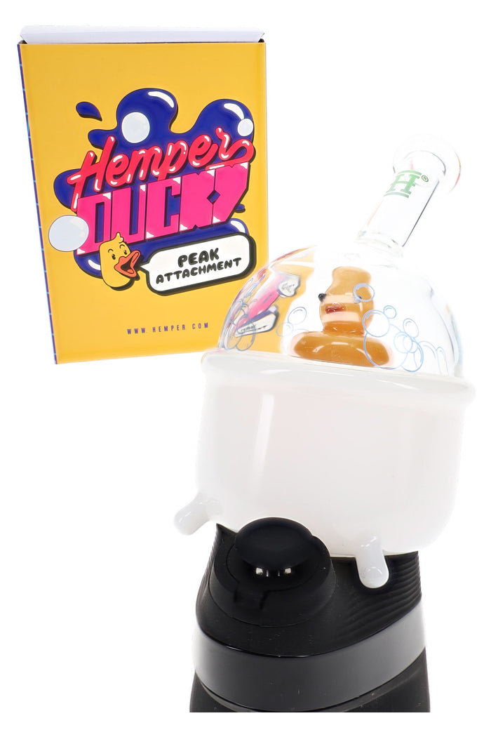 Hemper Ducky Puffco Peak top on device with yellow box, white tub base and bubble dome with duck perc detail