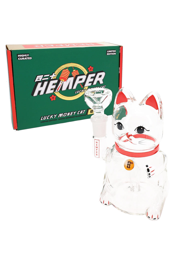 Hemper Lucky Money Cat 5-inch glass bong posed beside green branded gift box, showing beckoning kitty profile and bowl detail.