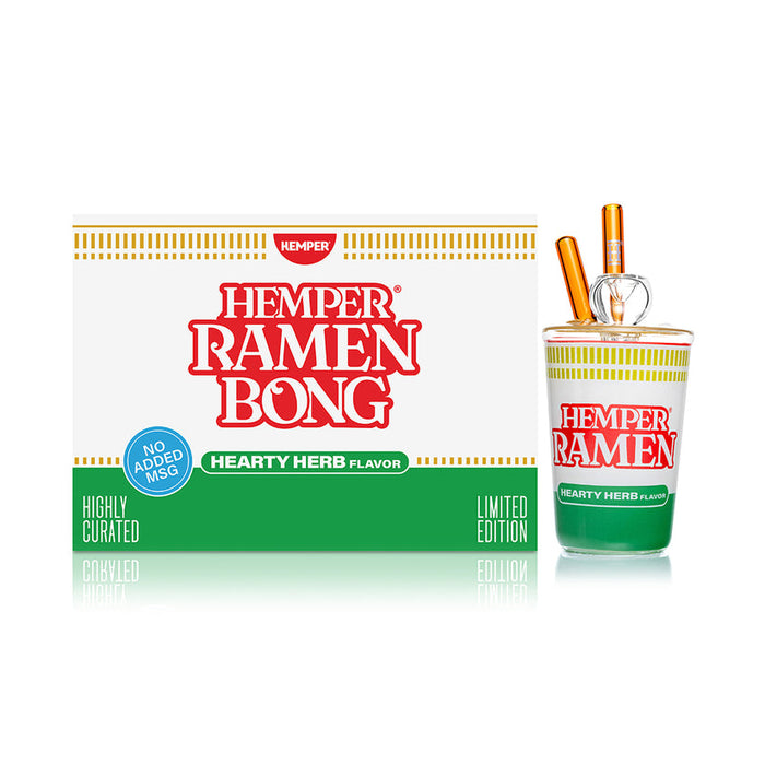 Hemper 7-inch ramen cup bong beside branded box, highlighting hearty herb graphics and compact novelty water pipe.