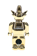 Front view of mirror-gold Weedbrick character glass hand pipe with contrasting dark bowl area and compact profile