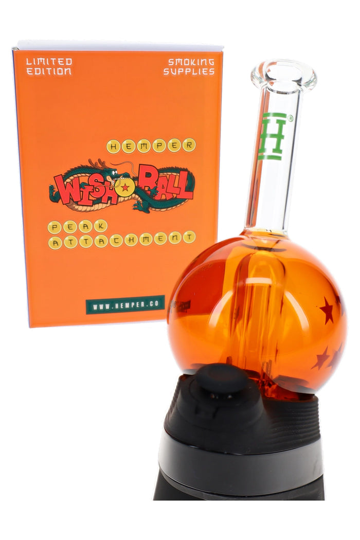 Hemper Wish Ball Puffco Peak top on device with orange box, bright orb chamber with star graphics and clear mouthpiece