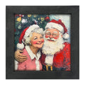 Santa and Mrs. Claus Smiling near Tree - Framed Art