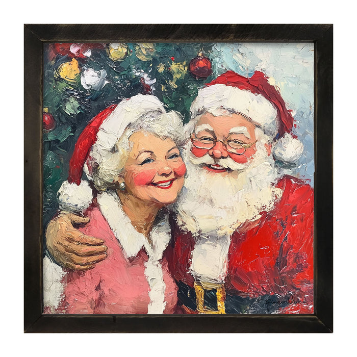 Santa and Mrs. Claus Smiling near Tree - Framed Art