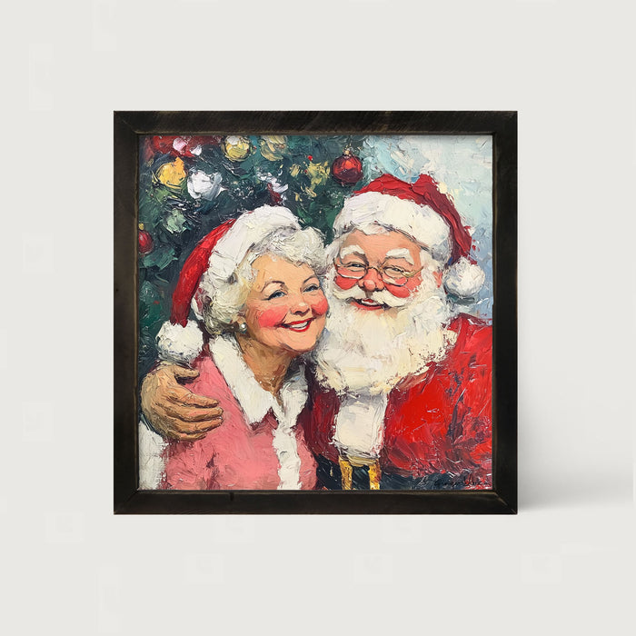 Santa and Mrs. Claus Smiling near Tree - Framed Art